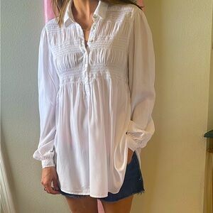 Lightweight, bohemian, relaxed, summer, long sleeved shirt or beach cover up.